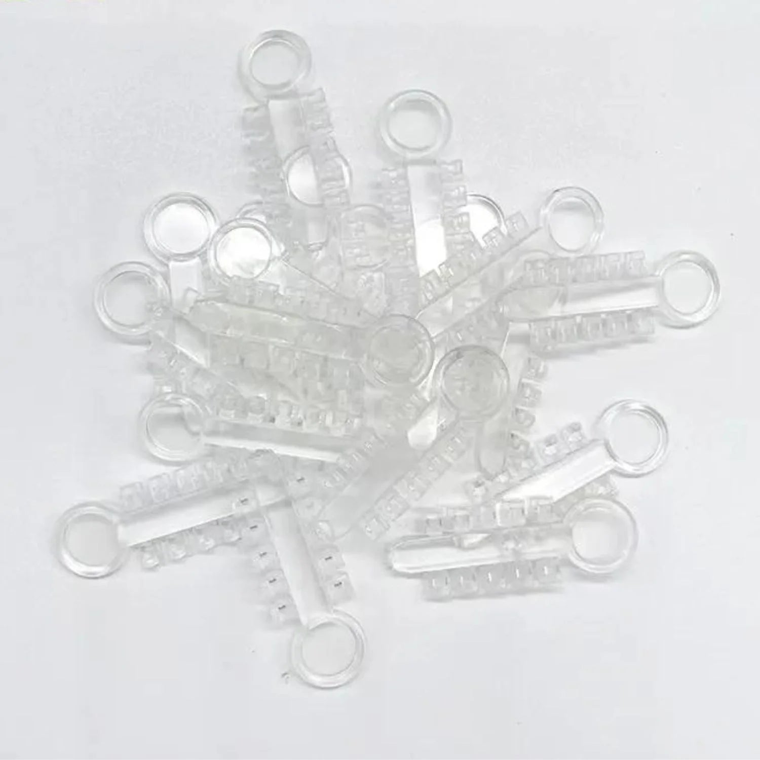 Ligatures élastométriques